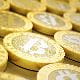 stacks of gold bit coins cryptocurrency